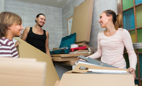 Moving team handling furniture safely during a Brompton relocation