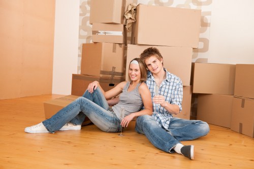 Packing boxes and furniture prepared for a Brompton home move