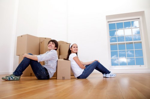 Local removal service preparing fragile items for safe transport