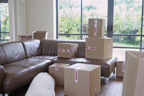 Professional movers assisting with a home relocation in a Brompton mews property